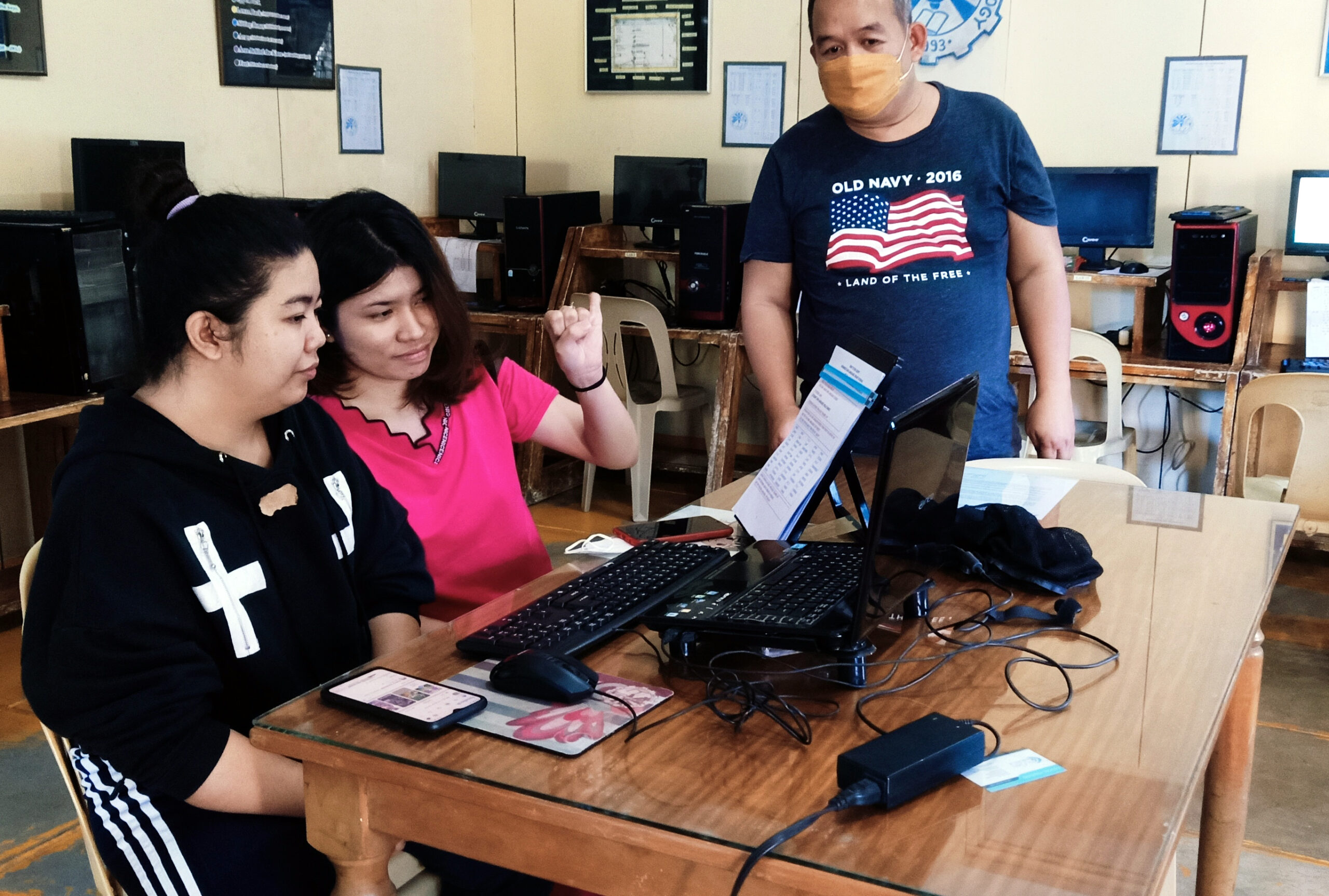 Deaf Tutors Alexandra and Jessica conducting online class with MCCID Deaf Coordinator Sir Ervin Reyes supervising.